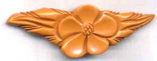 BP156 butterscotch bakelite flower pin